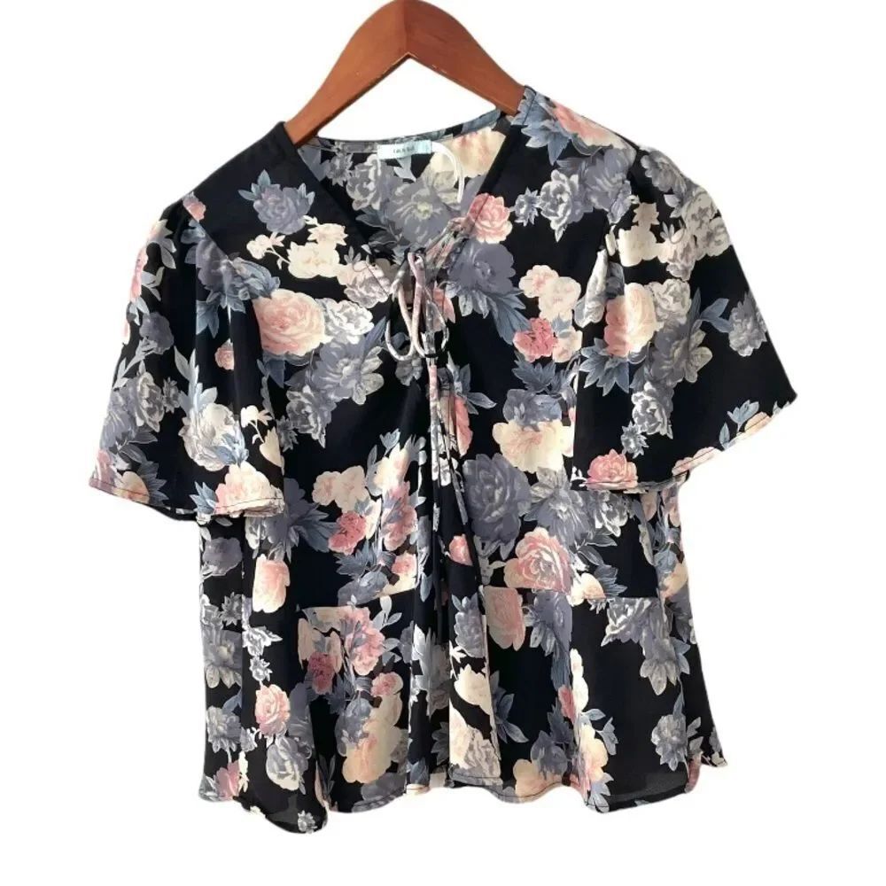 Kimichi Blue black floral tie front short sleeved top